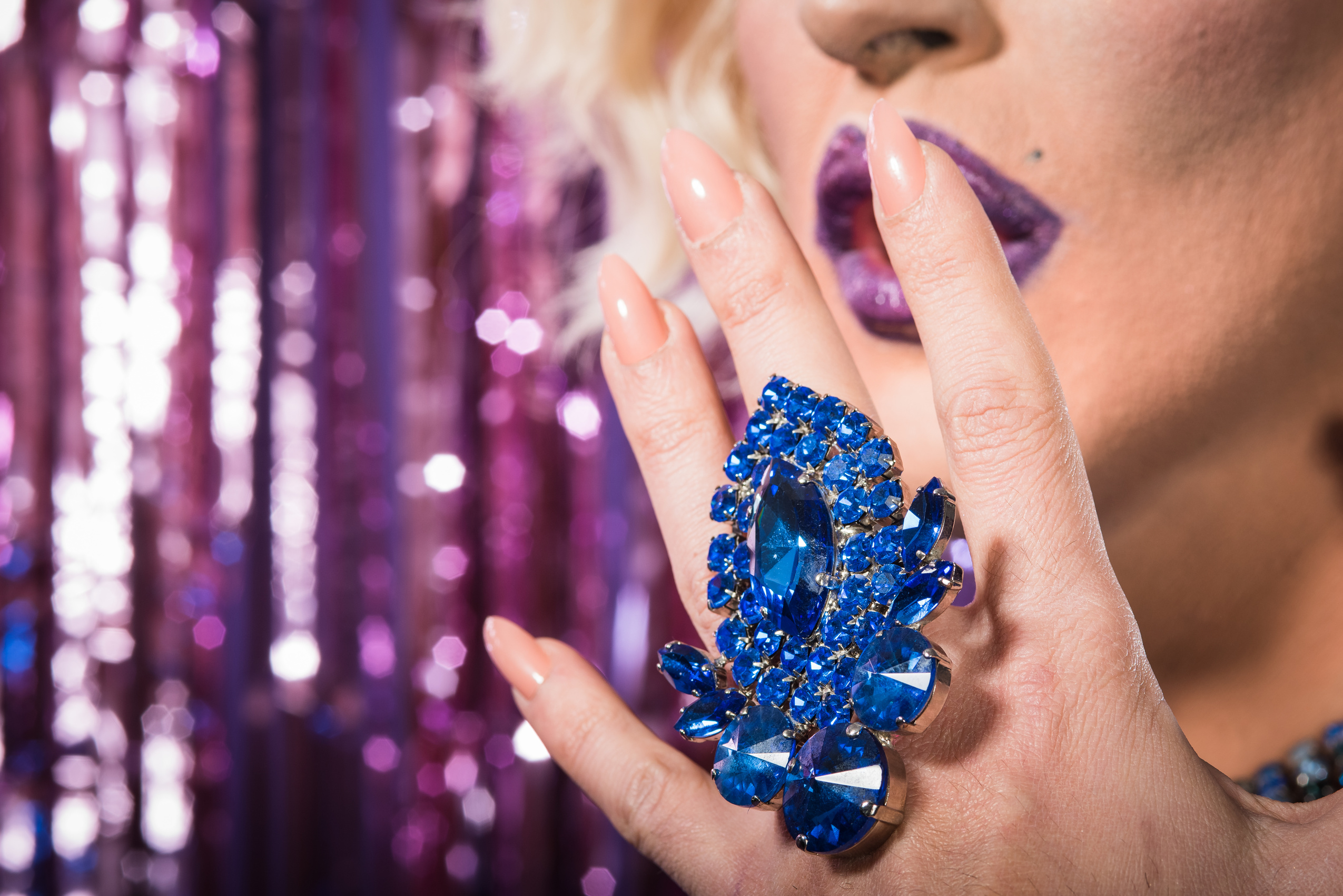 Drag Queen on Metallic Tinsel Background